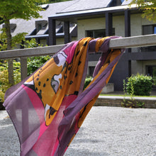 Load image into Gallery viewer, Cheetah Scarf Fuchsia featured outside The Prince &amp; Princess of Wales Hospice
