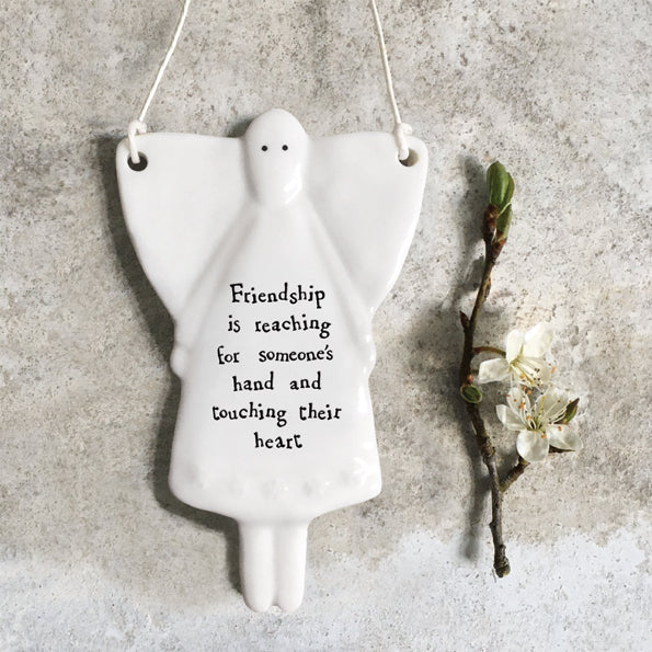 Hanging porcelain angel - friendship is reaching a hand
