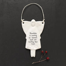 Load image into Gallery viewer, Hanging porcelain angel - friendship is reaching a hand
