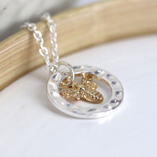 Load image into Gallery viewer, Silver plated hammered hoop and golden bee necklace by Pom

