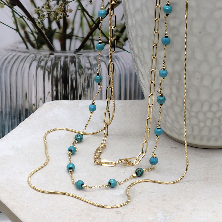 Triple layer golden mixed chain and turquoise bead necklace by Pom