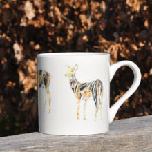 Load image into Gallery viewer, Ceramic mug featuring a Shruti Stag

